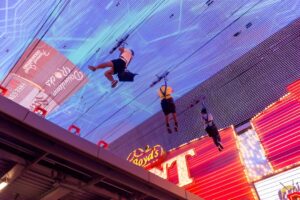 ziplining under the neon lights