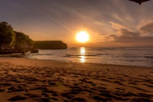 Balian Beach - My first time surfing at Balian, I wiped out spectacularly—but a local surfer named Made laughed and said, “The ocean teaches patience, not perfection.” Now, I come here every month to remind myself to slow down.