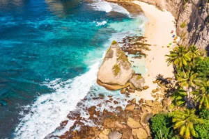 About a 30-minute scooter ride from Crystal Bay. Park at the cliffside warung and follow the steep stairs down.