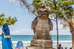 Kuta Beach - Just 10 minutes from Ngurah Rai Airport. Traffic can be wild—use Gojek or Grab scooters to skip jams.