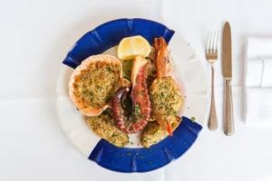 Matera, Italy % Scallops, cod, shrimp and seafood au gratin and grilled octopus