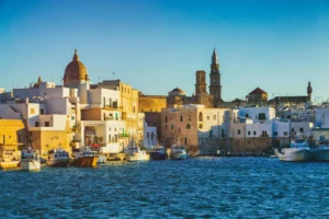 View of scenic city scape and a fishing hurber monopoli